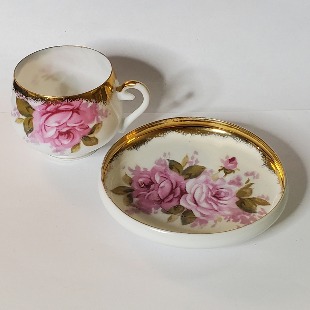 Vintage Midcentury Pink rose and gold trim unique tea cup and saucer Great condi